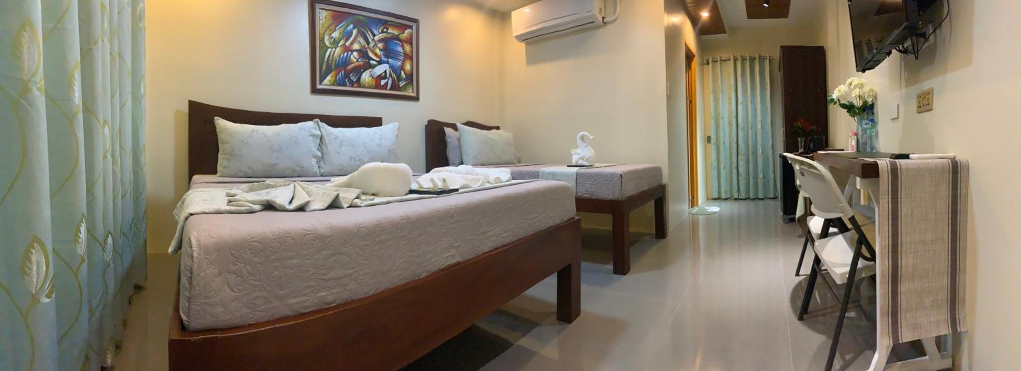 Ea Apartelle - Metro فيغان المظهر الخارجي الصورة