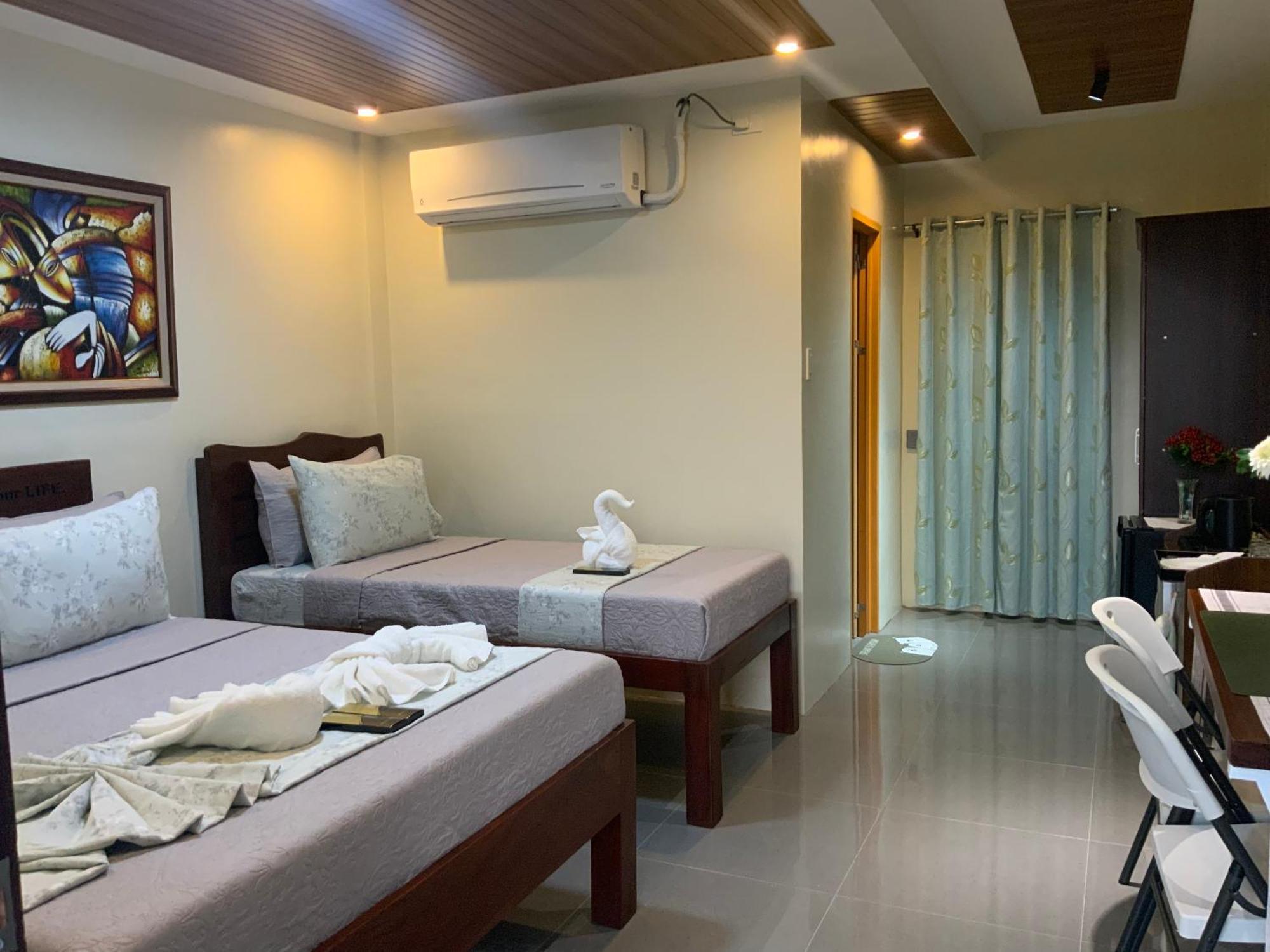 Ea Apartelle - Metro فيغان المظهر الخارجي الصورة