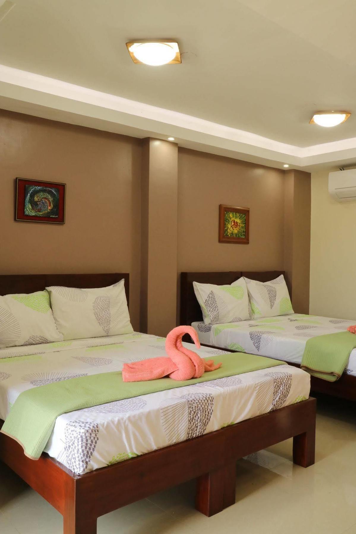 Ea Apartelle - Metro فيغان المظهر الخارجي الصورة